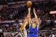 SAN ANTONIO, TX - MAY 06: Klay Thompson #11 of the Golden State Warriors takes a shot against Tony Parker #9 of the San Antonio Spurs during Game One of the Western Conference Semifinals of the 2013 NBA Playoffs at AT&T Center on May 6, 2013 in San Antonio, Texas. NOTE TO USER: User expressly acknowledges and agrees that, by downloading and or using this photograph, User is consenting to the terms and conditions of the Getty Images License Agreement. (Photo by Ronald Martinez/Getty Images)