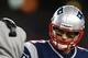 FOXBORO, MA - JANUARY 20: Tom Brady #12 talks with head coach Bill Belichick of the New England Patriots against the Baltimore Ravens during the 2013 AFC Championship game at Gillette Stadium on January 20, 2013 in Foxboro, Massachusetts. (Photo by Elsa/Getty Images)