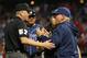 Apr 8, 2013; Arlington, TX, USA; Tampa Bay Rays manager Joe Maddon (70) argues a strike call ending the game against the Texas Rangers with umpire Mike Everitt (57) at the Rangers Ballpark in Arlington. The Rangers won 5-4. Mandatory Credit: Jim Cowsert-USA TODAY Sports