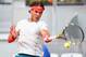 MADRID, SPAIN - MAY 08: Rafael Nadal of Spain in action against Benoit Paire of France during day five of the Mutua Madrid Open tennis tournament at the Caja Magica on May 8, 2013 in Madrid, Spain. (Photo by Julian Finney/Getty Images)