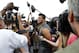 CORTLAND, NY - JULY 27: Tim Tebow #15 of the New York Jets talks to reporters at Jets Training Camp at SUNY Cortland on July 27, 2012 in Cortland, New York. (Photo by Jeff Zelevansky/Getty Images)