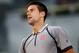 MADRID, SPAIN - MAY 07: Novak Djokovic of Serbia reacts during his match against Grigor Dimitrov of Bulgaria on day four of the Mutua Madrid Open tennis tournament at the Caja Magica on May 7, 2013 in Madrid, Spain. (Photo by Jasper Juinen/Getty Images)