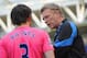 WIGAN, ENGLAND - APRIL 30: Everton manager David Moyes speaks to his player Leighton Baines before the Barclays Premier League match between Wigan and Everton at the DW Stadium on April 30, 2011 in Wigan, England. (Photo by Michael Regan/Getty Images)