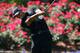 PONTE VEDRA BEACH, FL - MAY 10: Tiger Woods of the USA plays a shot from the 18th tee during round two of THE PLAYERS Championship at THE PLAYERS Stadium course at TPC Sawgrass on May 10, 2013 in Ponte Vedra Beach, Florida. (Photo by Richard Heathcote/Getty Images)