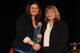 Holmes accepting the CWHL Humanitarian Award (Image by Brandon Taylor, Obtained from: http://cwhl.ca/view/cwhl/news-644/news_69385)