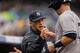 DENVER, CO - May 9: Manager Joe Girardi of the New York Yankees greets Jayson Nix #17 at the dugout after he scored during the first inning against the Colorado Rockies at Coors Field on May 9, 2013 in Denver, Colorado. (Photo by Justin Edmonds/Getty Images)