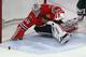 CHICAGO, IL - MAY 09: Corey Crawford #50 of the Chicago Blackhawks makes a save after losing his stick in the first period against the Minnesota Wild in Game Five of the Western Conference Quarterfinals during the 2013 NHL Stanley Cup Playoffs at the United Center on May 9, 2013 in Chicago, Illinois. The Blackhawks defeated the Wild 5-1 to win the series. (Photo by Jonathan Daniel/Getty Images)