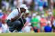 PONTE VEDRA BEACH, FL - MAY 11: Tiger Woods of the USA lines up a putt on the first green during round three of THE PLAYERS Championship at THE PLAYERS Stadium course at TPC Sawgrass on May 11, 2013 in Ponte Vedra Beach, Florida. (Photo by Sam Greenwood/Getty Images)