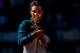 MADRID, SPAIN - MAY 12: Rafael Nadal of Spain bites his trophy after winning his final match against Stanislas Wawrinka of Switzerland on day nine of the Mutua Madrid Open tennis tournament at the Caja Magica on May 12, 2013 in Madrid, Spain. (Photo by Gonzalo Arroyo Moreno/Getty Images)