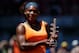 MADRID, SPAIN - MAY 12: Serena Williams of the US poses with the trophy after winning her final match against Maria Sharapova of Russia on day nine of the Mutua Madrid Open tennis tournament at the Caja Magica on May 12, 2013 in Madrid, Spain. (Photo by Gonzalo Arroyo Moreno/Getty Images)