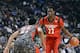 Apr 3, 2013; Chicago, IL, USA; McDonald's All American East forward Andrew Wiggins (22) dribbles the ball against McDonald's All American West forward Jabari Parker (22) during the first half at the United Center. Mandatory Credit: Mike DiNovo-USA TODAY Sports