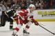 May 12, 2013; Anaheim, CA, USA; Detroit Red Wings left wing Justin Abdelkader (8) moves the puck toward the goal ahead of Anaheim Ducks defenseman Francois Beauchemin (23) during the first period in game seven of the first round of the 2013 Stanley Cup Playoffs at the Honda Center. Mandatory Credit: Gary A. Vasquez-USA TODAY Sports
