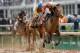 LOUISVILLE, KY - MAY 04: Jockey Joel Rosario guides Orb to the finish line to win the 139th running of the Kentucky Derby at Churchill Downs on May 4, 2013 in Louisville, Kentucky. (Photo by Rob Carr/Getty Images)