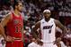 May 8, 2013; Miami, FL, USA; Miami Heat small forward LeBron James (6) looks at Chicago Bulls center Joakim Noah (13) during the second half in game two of the second round of the 2013 NBA Playoffs at American Airlines Arena. The Heat won 115-78. Mandatory Credit: Robert Mayer-USA TODAY Sports