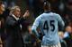 MANCHESTER, ENGLAND - OCTOBER 27: Manchester City Manager Roberto Mancini speaks to Mario Balotelli during the Barclays Premier League match between Manchester City and Swansea City at the Etihad Stadium on October 27, 2012 in Manchester, England. (Photo by Clive Brunskill/Getty Images)