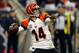 HOUSTON, TX - JANUARY 05: Andy Dalton #14 of the Cincinnati Bengals throws a pass against the Houston Texans during their AFC Wild Card Playoff Game at Reliant Stadium on January 5, 2013 in Houston, Texas. (Photo by Bob Levey/Getty Images)