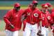 CINCINNATI, OH - APRIL 4: Manager Dusty Baker and Aroldis Chapman #54 of the Cincinnati Reds celebrate after the final out of the game against the Los Angeles Angels of Anaheim at Great American Ball Park on April 4, 2013 in Cincinnati, Ohio. The Reds won 5-4. (Photo by Joe Robbins/Getty Images)