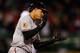 BOSTON, MA - APRIL 10: Manny Machado #13 of the Baltimore Orioles reacts after hitting a three-run home run off of Joel Hanrahan #52 of the Boston Red Sox in the ninth inning at Fenway Park on April 10, 2013 in Boston, Massachusetts. (Photo by Jim Rogash/Getty Images)