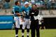 JACKSONVILLE, FL - AUGUST 30: Blaine Gabbert #11 of the Jacksonville Jaguars (L), #7 Chad Henne, and Assistant coach Greg Olson talk during a preseason game against the Atlanta Falcons at EverBank Field on August 30, 2012 in Jacksonville, Florida. (Photo by Sam Greenwood/Getty Images)