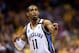 MEMPHIS, TN - MAY 13: Mike Conley #11 of the Memphis Grizzlies motions to teammates in the last seconds as the Grizzlies defeat the Oklahoma City Thunder 103-97 in overtime to win Game Four of the Western Conference Semifinals of the 2013 NBA Playoffs at FedExForum on May 13, 2013 in Memphis, Tennessee. (Photo by Jamie Squire/Getty Images)