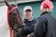 BALTIMORE, MD - MAY 15: Kentucky Derby winner Orb gets a blanket put on him by exercise rider Jennifer Patterson and trainer Shug McGaughey
following a workout in preparation for the 138th Preakness Stakes at Pimlico Race Course on May 15, 2013 in Baltimore, Maryland. (Photo by Rob Carr/Getty Images)