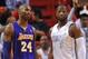 Feb 10, 2013; Miami, FL, USA; Los Angeles Lakers shooting guard Kobe Bryant (24) and Miami Heat shooting guard Dwyane Wade (3) during the second half at American Airlines Arena. Miami won 107-97. Mandatory Credit: Steve Mitchell-USA TODAY Sports