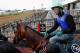 BALTIMORE, MD - MAY 15: Jockey Kevin Krigger takes Preakness entrant Goldencents out of the paddock in preparation for the 138th Preakness Stakes at Pimlico Race Course on May 15, 2013 in Baltimore, Maryland. (Photo by Rob Carr/Getty Images)