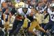 Kyle Van Noy returns an interception against Notre Dame.