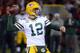 SAN FRANCISCO, CA - JANUARY 12: Quarterback Aaron Rodgers #12 of the Green Bay Packers throws the ball against the San Francisco 49ers during the NFC Divisional Playoff Game at Candlestick Park on January 12, 2013 in San Francisco, California. (Photo by Harry How/Getty Images)