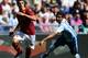 ROME, ITALY - APRIL 21: Erik Lamela (L) of AS Roma competes for the ball with Marco Capuano of Pescara during the Serie A match between AS Roma and Pescara at Stadio Olimpico on April 21, 2013 in Rome, Italy. (Photo by Paolo Bruno/Getty Images)