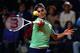 ROME, ITALY - MAY 16: Roger Federer of Switzerland in action during his third round match against Gilles Simon of France on day five of the Internazionali BNL d'Italia 2013 at the Foro Italico Tennis Centre on May 16, 2013 in Rome, Italy. (Photo by Clive Mason/Getty Images)
