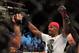 Apr 27, 2013; Newark, NJ, USA; Jon Jones (black shorts) celebrates defeating Chael Sonnen (white shorts) during UFC 159 at the Prudential Center. Mandatory Credit: Brad Penner-USA TODAY Sports