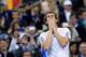 Andy Murray composes himself after winning in 2012