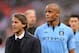 LONDON, ENGLAND - MAY 11: Manager Roberto Mancini of Manchester City and Vincent Kompany look dejected in defeat after the FA Cup with Budweiser Final between Manchester City and Wigan Athletic at Wembley Stadium on May 11, 2013 in London, England. (Photo by Mike Hewitt/Getty Images)