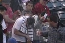Fans Demonstrates Why You Shouldn't Try to Catch a Baseball with a Full Beer