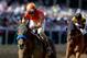 BALTIMORE, MD - MAY 17: Fiftyshadesofhay, ridden by Joel Rosario, pulls up after crossing the finish line after winning the 89th Black-Eyed Susan Stakes at Pimlico Race Course on May 17, 2013 in Baltimore, Maryland. (Photo by Matthew Stockman/Getty Images)