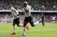 LONDON, ENGLAND - MAY 13: Jermain Defoe of Tottenham Hotspur celebrates scoring his side's second goal with team mate Aaron Lennon (L) during the Barclays Premier League match between Tottenham Hotspur and Fulham at White Hart Lane on May 13, 2012 in London, England. (Photo by Clive Rose/Getty Images)