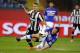 Sebastian Giovinco and Daniele Gastaldello battle for a ball in Saturday's matchup. It was yet another underwhelming performance for Giovinco and the Juve strikers as a whole.