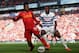 LIVERPOOL, ENGLAND - MAY 19: Nedum Onuoha of Queens Park Rangers competes with Daniel Sturridge of Liverpool during the Barclays Premier League match between Liverpool and Queens Park Rangers at Anfield on May 19, 2013 in Liverpool, England. (Photo by Julian Finney/Getty Images)