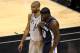 SAN ANTONIO, TX - MAY 19: (L-R) Tim Duncan #21 of the San Antonio Spurs and Zach Randolph #50 of the Memphis Grizzlies share a laugh on court in the first half during Game One of the Western Conference Finals of the 2013 NBA Playoffs at AT&T Center on May 19, 2013 in San Antonio, Texas. NOTE TO USER: User expressly acknowledges and agrees that, by downloading and or using this photograph, User is consenting to the terms and conditions of the Getty Images License Agreement. (Photo by Stephen Dunn/Getty Images)