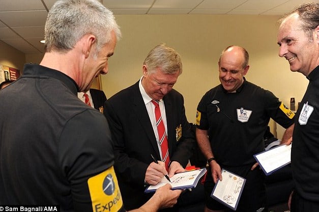 Team of Officials Queue for Ferguson's Autograph After Final Game in Charge
