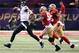 Feb 3, 2013; New Orleans, LA, USA; Baltimore Ravens quarterback Joe Flacco (5) runs from San Francisco 49ers linebackers NaVorro Bowman (53) and Ahmad Brooks (55) during Super Bowl XLVII at the Mercedes-Benz Superdome. Mandatory Credit: Chuck Cook-USA TODAY Sports