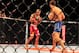 May 18, 2013; Jaragua do Sul, BRAZIL; Luke Rockhold (blue shorts) fights against Vitor Belfort (red shorts) during UFC on FX 8 at ARena Jaragua. Mandatory Credit: Jason da Silva-USA TODAY Sports