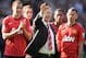 WEST BROMWICH, ENGLAND - MAY 19: Manchester United manager Sir Alex Ferguson is applauded by players Rio Ferdinand and Ryan Giggs after his 1,500th and final match in charge of the club following the Barclays Premier League match between West Bromwich Albion and Manchester United at The Hawthorns on May 19, 2013 in West Bromwich, England. (Photo by Michael Regan/Getty Images)