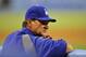 May 14, 2013; Los Angeles, CA, USA; Los Angeles Dodgers manager Don Mattingly (8) watches game action during the second inning against the Washington Nationals at Dodger Stadium. Mandatory Credit: Gary A. Vasquez-USA TODAY Sports
