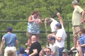 Husband absolves beer-tossing wife for Wrigley bleacher incident