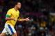 MANCHESTER, ENGLAND - AUGUST 07: Leandro Damiao of Brazil reacts after scoring during the Men's Football Semi Final match between Korea and Brazil, on Day 11 of the London 2012 Olympic Games at Old Trafford on August 7, 2012 in Manchester, England. (Photo by Stanley Chou/Getty Images)