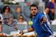 MADRID, SPAIN - MAY 11: Stanislas Wawrinka of Switzerland lines up a shot to Tomas Berdych of Czech Republic in the semi-final match on day eight of the Mutua Madrid Open tennis tournament at the Caja Magica on May 11, 2013 in Madrid, Spain. (Photo by Gonzalo Arroyo Moreno/Getty Images)