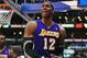 January 4, 2013; Los Angeles, CA, USA; Los Angeles Lakers center Dwight Howard (12) reacts after fouling Los Angeles Clippers point guard Chris Paul (3) during the second half at Staples Center. Mandatory Credit: Gary A. Vasquez-USA TODAY Sports