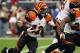 Jan 5, 2013; Houston, TX, USA; Cincinnati Bengals running back BenJarvus Green-Ellis (42) rushes against the Houston Texans during the first quarter of the AFC Wild Card playoff game at Reliant Stadium. Mandatory Credit: Troy Taormina-USA TODAY Sports